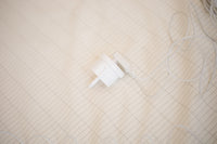 Close-up of the earthing plug on an earthing sheet