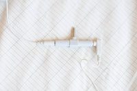 Earthing splitter and cable over the edge of an earthing sheet